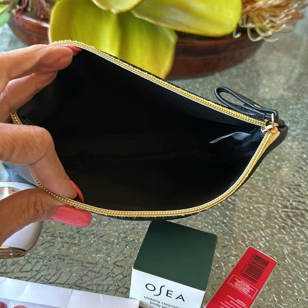 COSMETIC BAG WITH LOTS OF LITTLE ITEMS!  CLARINS LIPSTICK 738V IS FULL SIZE